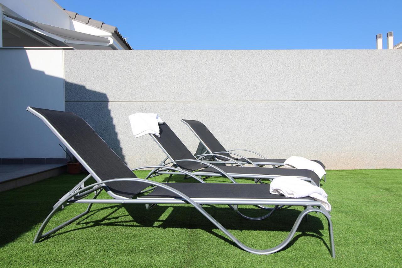 サグント Global Properties, Bonito Adosado Con Jardin En La Playa De Almardaヴィラ エクステリア 写真